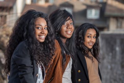 Outdoor Portrait of happy young african american teenage girls